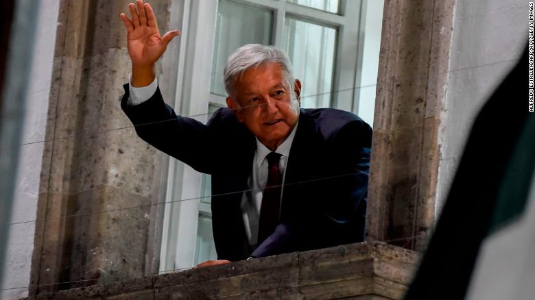 Andres Manuel Lopez Obrador waves to his supporters after an apparent victory in Mexico&#39;s general election on July 1, 2018.