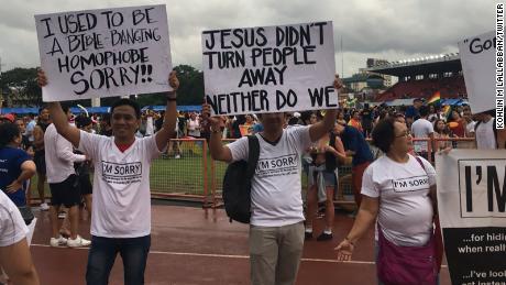 Some church members made their own signs.