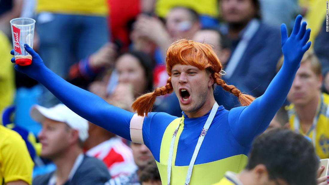 A Sweden fan shows his support during the Switzerland match.