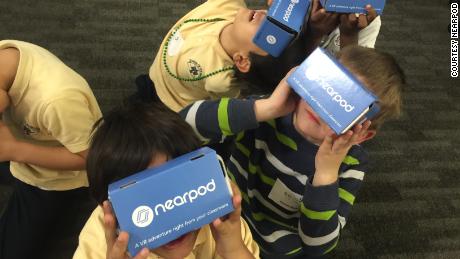 Children use Nearpod VR headsets.