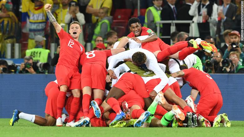 English players react after their shootout win over Colombia on Tuesday, July 3. The match was tied 1-1 after extra time.