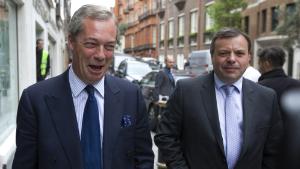 UK Independence Party (UKIP) leader Nigel Farage (L) and major donor Arron Banks leave the party&#39;s head office in central London on May 15, 2015. A week after an election in which it won the third-biggest share of the national vote but just one seat in parliament, Britain&#39;s UK Independence Party is tearing itself apart in spectacular fashion. First there was charismatic party leader Nigel Farage&#39;s short-lived resignation, then a big fallout over finances and on May 14 a stunning attack on him from the head of his election campaign. Justin Tallis/AFP/Getty Images 