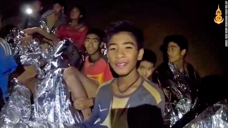 The boys in the cave receive medical attention in this image that was taken from video last week. All of them have since been rescued.