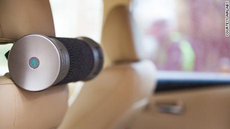 The Airbubbl filter attaches to a car&#39;s headrest.