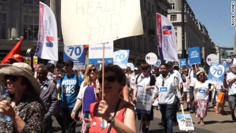 The NHS Anti-Swindle Team marched to mark NHS&#39; 70th anniversary.