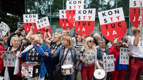 Demonstrators protest against Poland's Law on the Supreme Court in Warsaw in July.