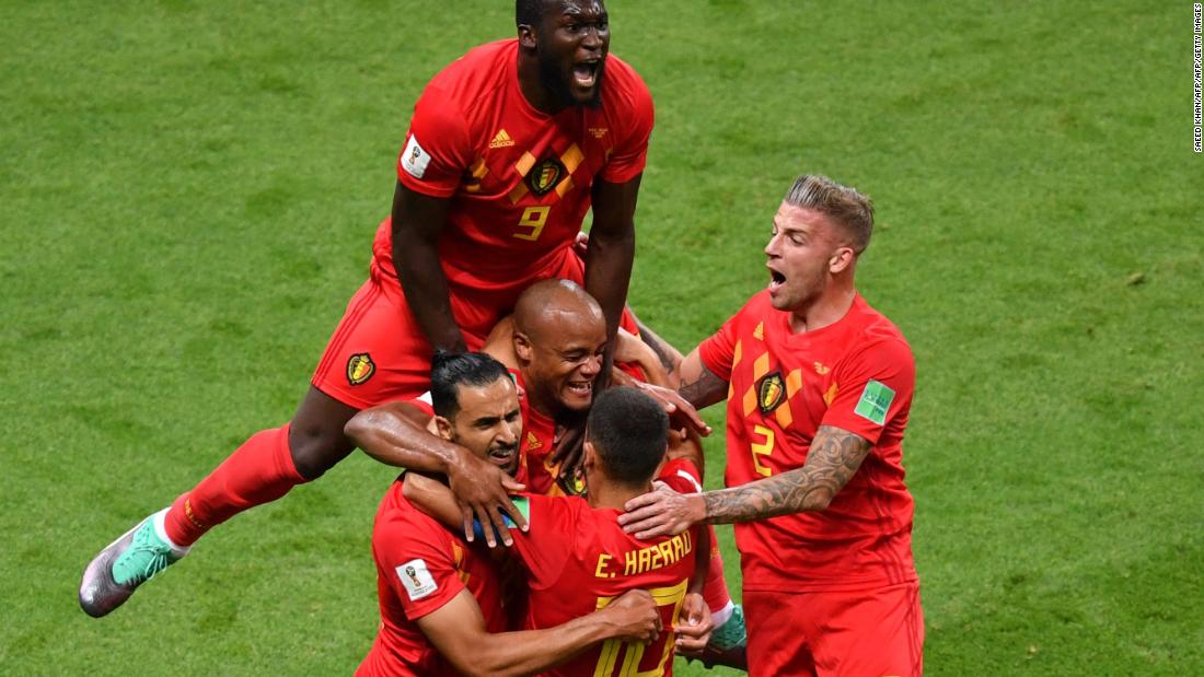 Belgium celebrates their first goal, which came off a deflected header in the 13th minute.