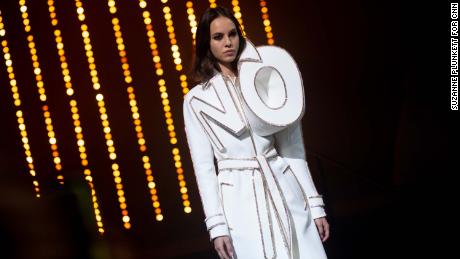 A model presents a creation during the Viktor &amp; Rolf 25th Anniversary catwalk show at the Trianon Theatre in Paris, July 4, 2018.