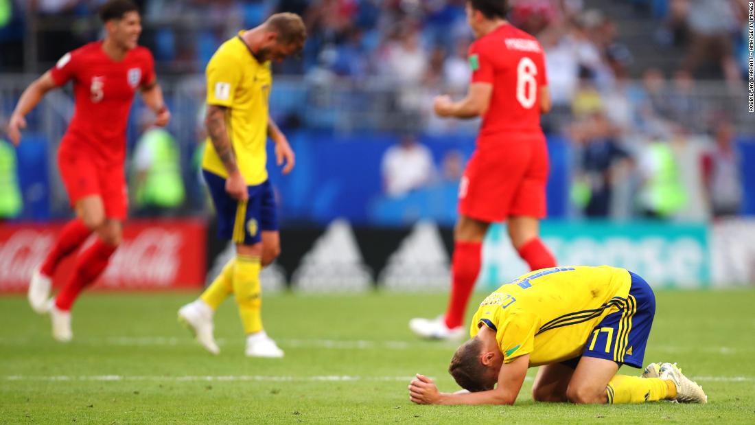 Swedish players are dejected at the end of the match.