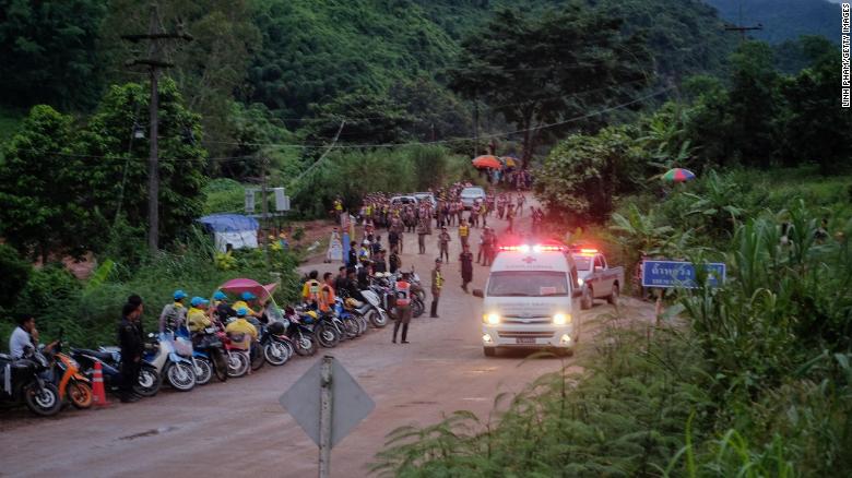 An ambulance leaves the Tham Luang cave area after divers evacuated some of the 12 boys trapped with their coach for 15 days.