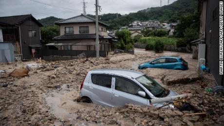 Japan floods: Heat wave adds to misery in devastated areas - CNN