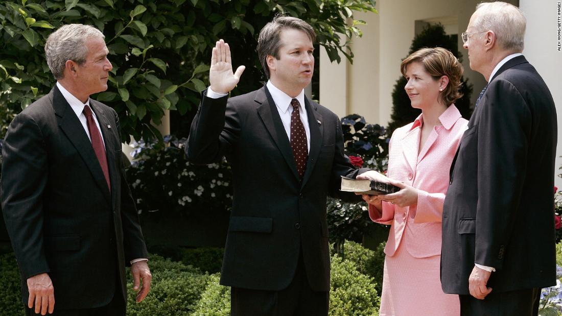 Kavanaugh is joined by his wife and US President George W. Bush as Justice Anthony Kennedy swears him in to be a federal judge in June 2006. Kavanaugh once clerked for Kennedy and now could be the judge to replace him on the Supreme Court.