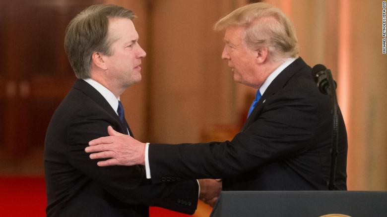 Supreme Court nominee Brett Kavanaugh, left, shakes hands with President Donald Trump on Monday, July 9.