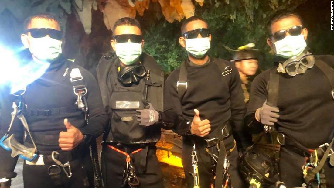 Thai Navy SEALs pose for a photo after the rescue effort was finished on July 10. One of them was a doctor who stayed with the team for a week after the group was found alive on July 2.