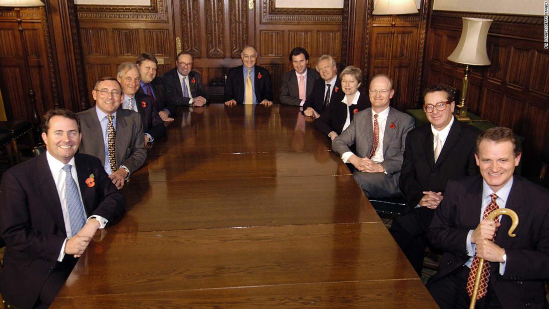 May and the rest of the shadow Cabinet in November 2003. The shadow Cabinet is the opposition party&#39;s senior leadership. May held various posts while in Parliament.