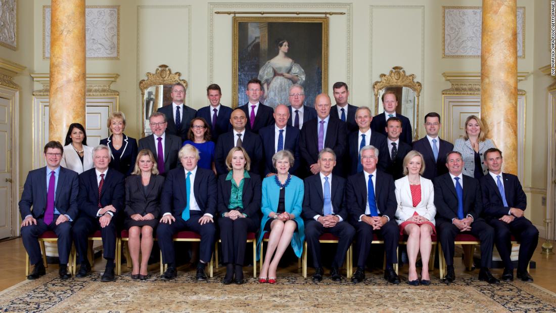 May, in the center of the front row, with members of her Cabinet in September 2016.