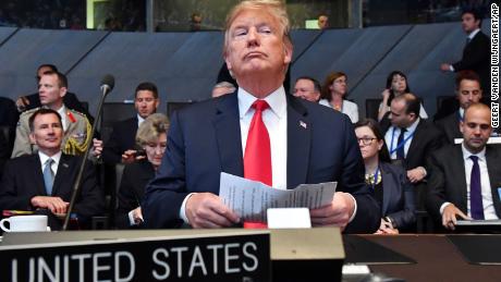 U.S. President Donald Trump attends a meeting of the North Atlantic Council during a summit of heads of state and government at NATO headquarters in Brussels on Wednesday, July 11, 2018. NATO leaders gather in Brussels for a two-day summit to discuss Russia, Iraq and their mission in Afghanistan. (AP Photo/Geert Vanden Wijngaert)