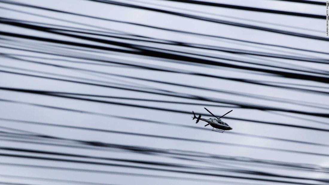 A helicopter transports rescued boys to the hospital on July 10.