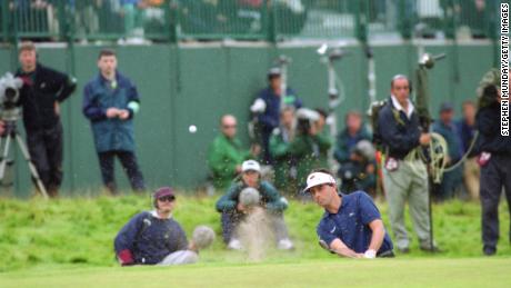 French golfer Jean Van de Velde takes his 6th shot on the 18th green in the final round of the British Open Championship at Carnoustie, Scotland, 18th July 1999. Having arrived at the 18th tee with a three-shot lead, Van de Velde narrowly lost the championship to Paul Lawrie. (Photo by Stephen Munday/Getty Images)