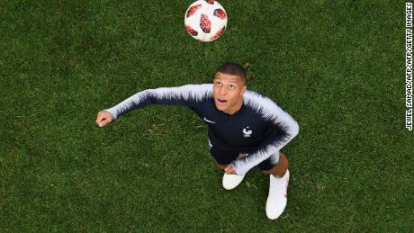 France&#39;s forward Kylian Mbappe eyes the ball as he warms up prior to the Russia 2018 World Cup semi-final football match between France and Belgium at the Saint Petersburg Stadium in Saint Petersburg on July 10, 2018. (Photo by Jewel SAMAD / AFP) / RESTRICTED TO EDITORIAL USE - NO MOBILE PUSH ALERTS/DOWNLOADS        (Photo credit should read JEWEL SAMAD/AFP/Getty Images)