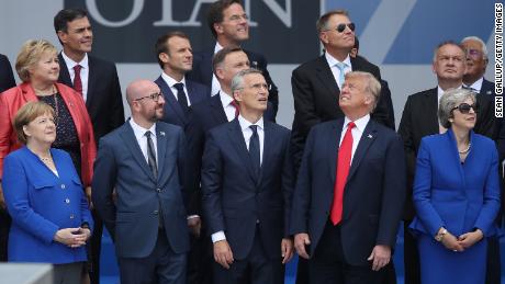 Trump was &#39;all snarls&#39; in public, but &#39;all smiles&#39; in private at NATO, diplomats say