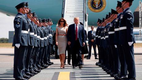 Donald Trump and first lady Melania Trump step off Air Force One as they arrive at London&#39;s Stansted airport.