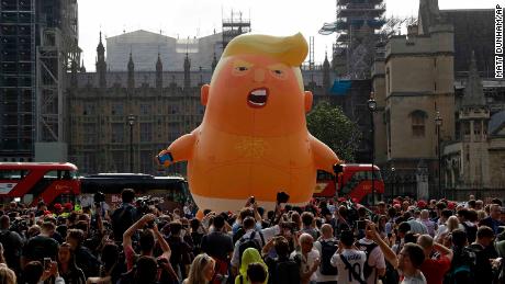 'Trump Baby' balloon takes flight in London protests