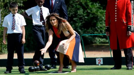 LONDON, ENGLAND - JULY 13: U.S. First Lady Melania Trump plays bowls she meets British military veterans known as &quot;Chelsea Pensioners&quot; at Royal Hospital Chelsea on July 13, 2018 in London, England. America&#39;s First Lady visited the Chelsea Pensioners while her husband, President Donald Trump, held bi-lateral talks with Theresa May at the Prime Minister&#39;s Country Residence.  The Chelsea Pensioners are British Army personnel who are cared for at at the Services retirement home at The Royal Hospital in London. (Photo by Luca Bruno - WPA Pool/Getty Images)