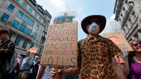 A protest sign playing on words from a &#39;Mary Poppins&#39; song.