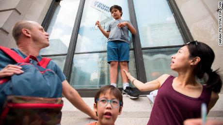 The Hofford family from Hong Kong attends the protest.