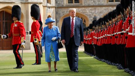Trump criticized for his stroll with Queen 