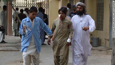 A victim of the bomb blast in Balochistan is brought to a hospital in Quetta on Friday.