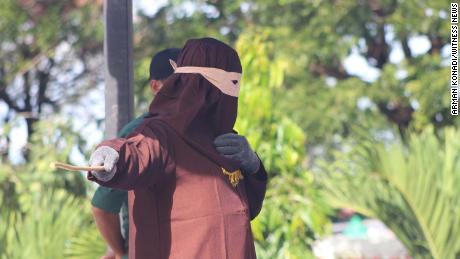Gay men, adulterers publicly flogged in Aceh, Indonesia  
