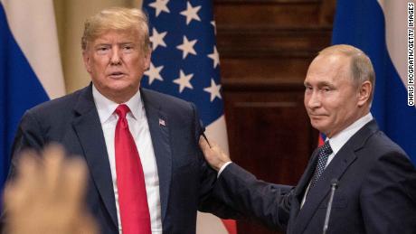 HELSINKI, FINLAND - JULY 16:  U.S. President Donald Trump (L) and Russian President Vladimir Putin shake hands during a joint press conference after their summit on July 16, 2018 in Helsinki, Finland. The two leaders met one-on-one and discussed a range of issues including the 2016 U.S Election collusion.  (Photo by Chris McGrath/Getty Images)