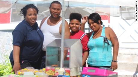 Jaequan and his family at his stand on the second day of official business.
