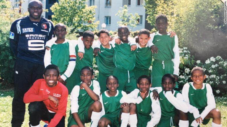 Kylian Mbappe (bottom right) playing for AS Bondy in 2008 aged nine.