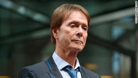 Cliff Richard leaves the court building Wednesday after winning his case.