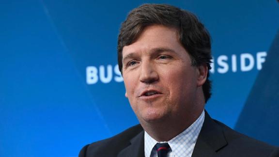 Tucker Carlson targeted by left-wing activists who descended on his DC ...