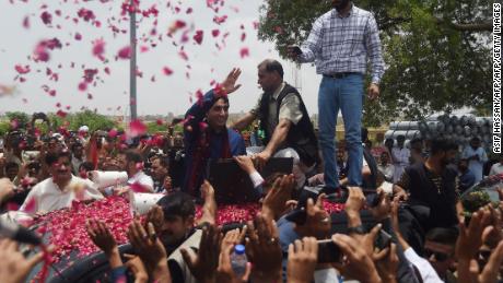 Pakistan Peoples Party (PPP) chairman Bilawal Bhutto Zardari (middle) waves to supporters on the outskirts of Karachi on July 2, 2018.