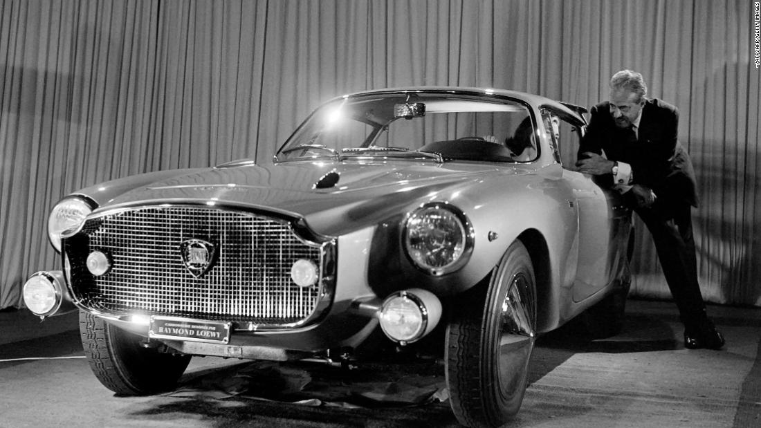 Industrial designer Raymond Loewy (1893-1986) presents his Lancia model car in October 1960.