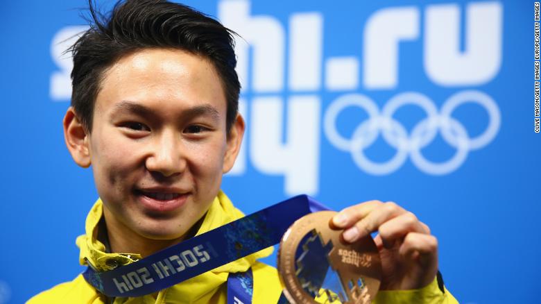 SOCHI, RUSSIA - FEBRUARY 15:  Bronze medalist Denis Ten of Kazakhstan celebrates during the medal ceremony for the Men&#39;s Figure Skating on day 8 of the Sochi 2014 Winter Olympics at Medals Plaza on February 15, 2014 in Sochi, Russia.  (Photo by Clive Mason/Getty Images)