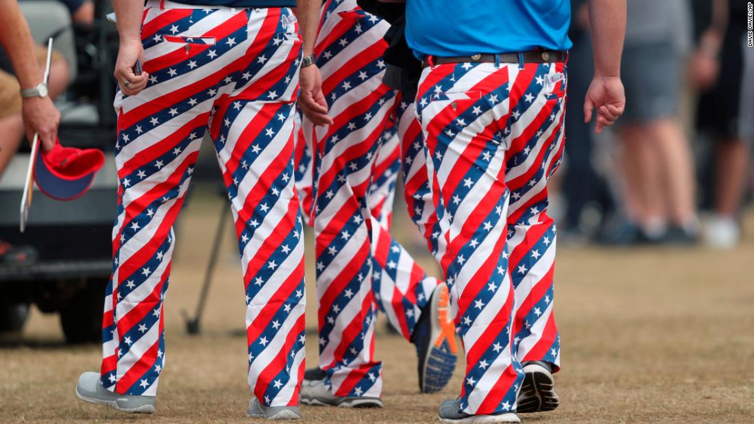 Fans don USA-themed trousers on the third day of the Open.
