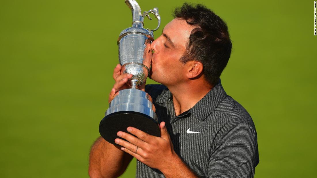 Molinari kisses the Claret Jug after the final round. He is the first Italian to win a major.