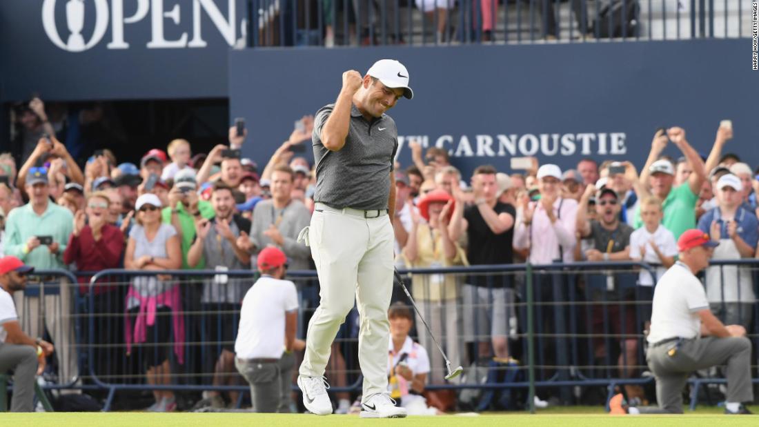 Francesco Molinari celebrates after sinking a putt on the last hole of the Open Championship on Sunday, July 22. He won by two strokes for his first career major.