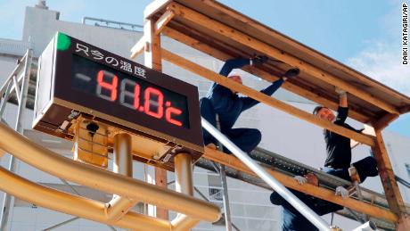 An outdoor thermometer reads 41.0 degrees Celsius (105.8 degrees Fahrenheit) in Kumagaya city, north of Tokyo, Monday, July 23, 2018.
