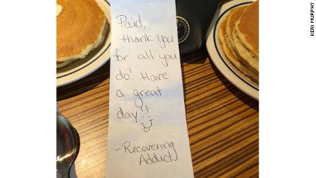 'Recovering addict' secretly treats a table of EMTs to breakfast, bringing them to tears