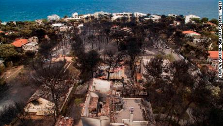 An aerial view shows burned-out houses in Mati.