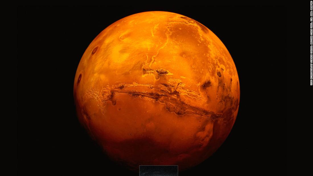 An artistic impression of the Mars Express spacecraft probing the southern hemisphere of Mars. Radar detected a lake of liquid water beneath the surface.