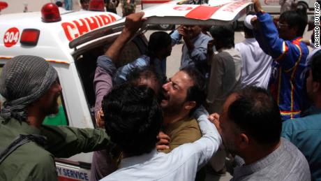 A man mourns the death of a relative at the site of a bombing in Quetta, Pakistan, on Wednesday.