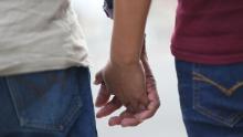 EL PASO, TX - JULY 24:  A man, identified only as Tomas, holds hands with his daughter, Yessica, 13, as they are cared for in an Annunciation House facility after they were reunited yesterday on July 24, 2018 in El Paso, Texas. Tomas and Yessica, originally from Guatemala, were reunitd at an I.C.E processing center two months after the two were separated when they tried to cross into the United States. It is unclear if a court-ordered July 26 deadline will be met for the U.S. government to reunite as many as 2,551 migrant children ages 5 to 17 that had been separated from their families.  (Photo by Joe Raedle/Getty Images)